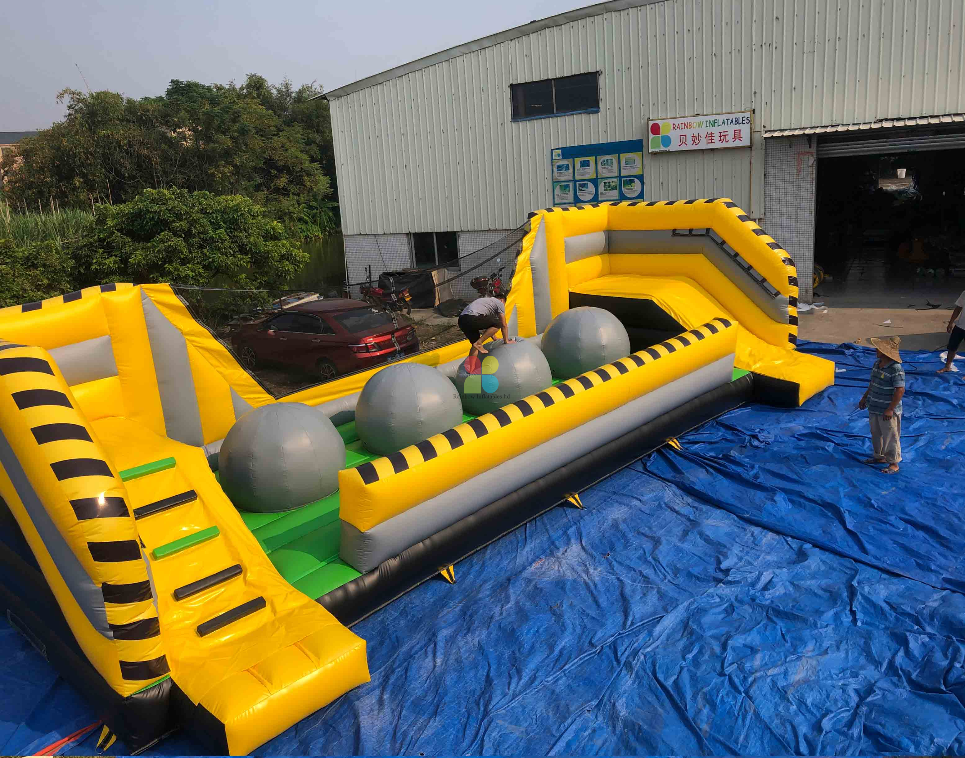 INFLATABLE YELLOW AND GREEN BIG BALLER GAME